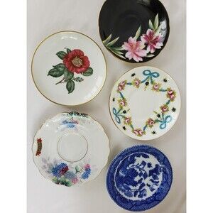 Set of 5 antique saucers